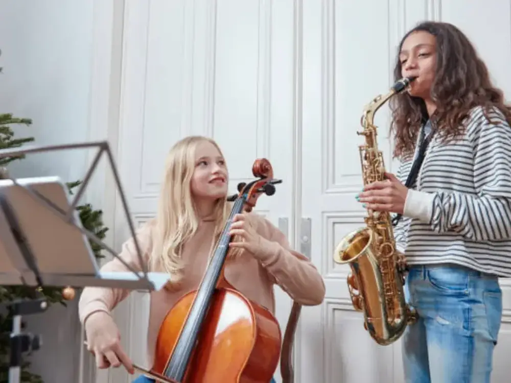 Students playing cello and saxophone together at Morningside